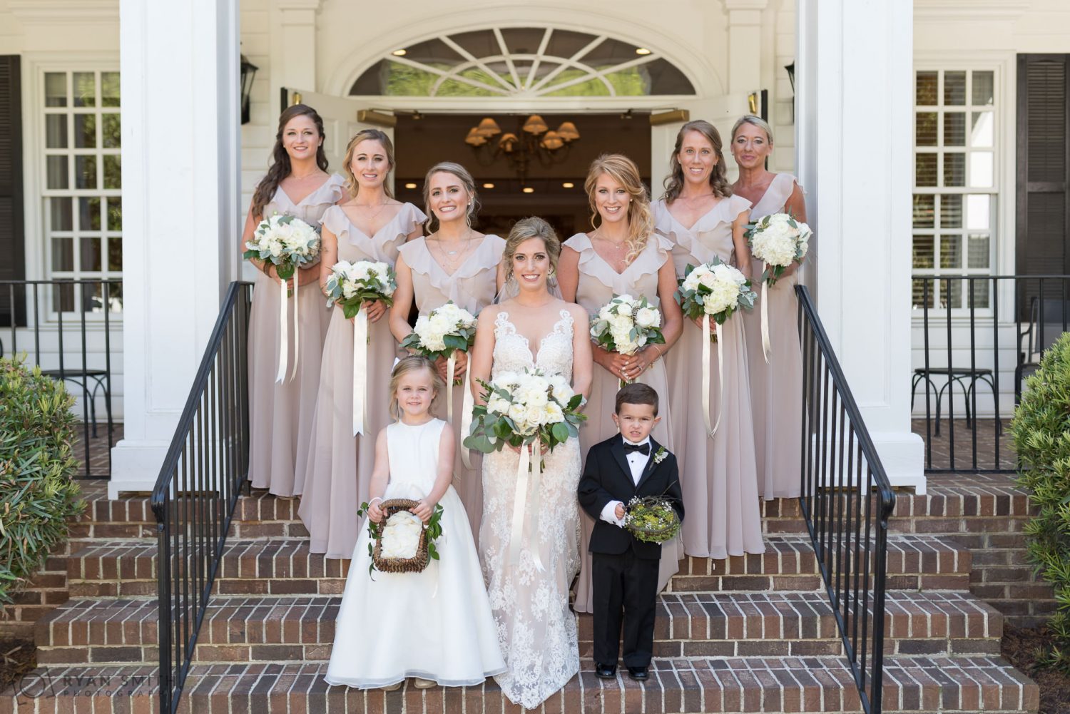 Bridal party on steps before the ceremony Pawleys Plantation