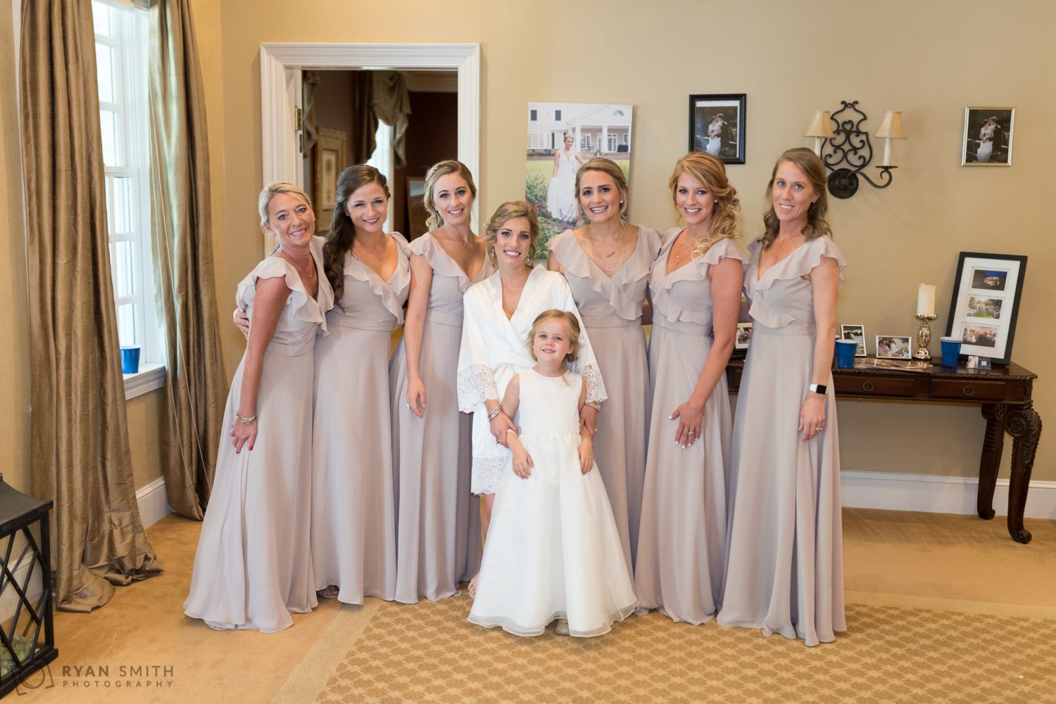 Bridesmaids with bride before she puts on dress Pawleys Plantation