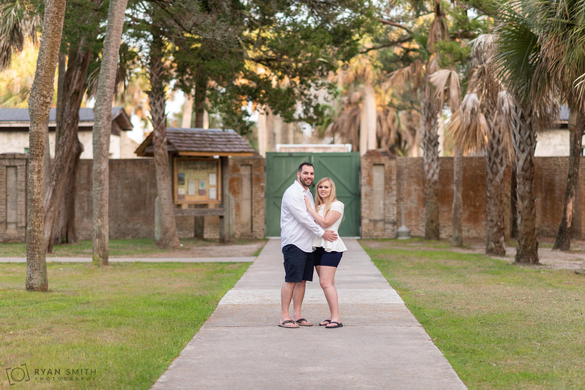 Engagement portrait by the Atalaya Castle Huntington Beach State Park