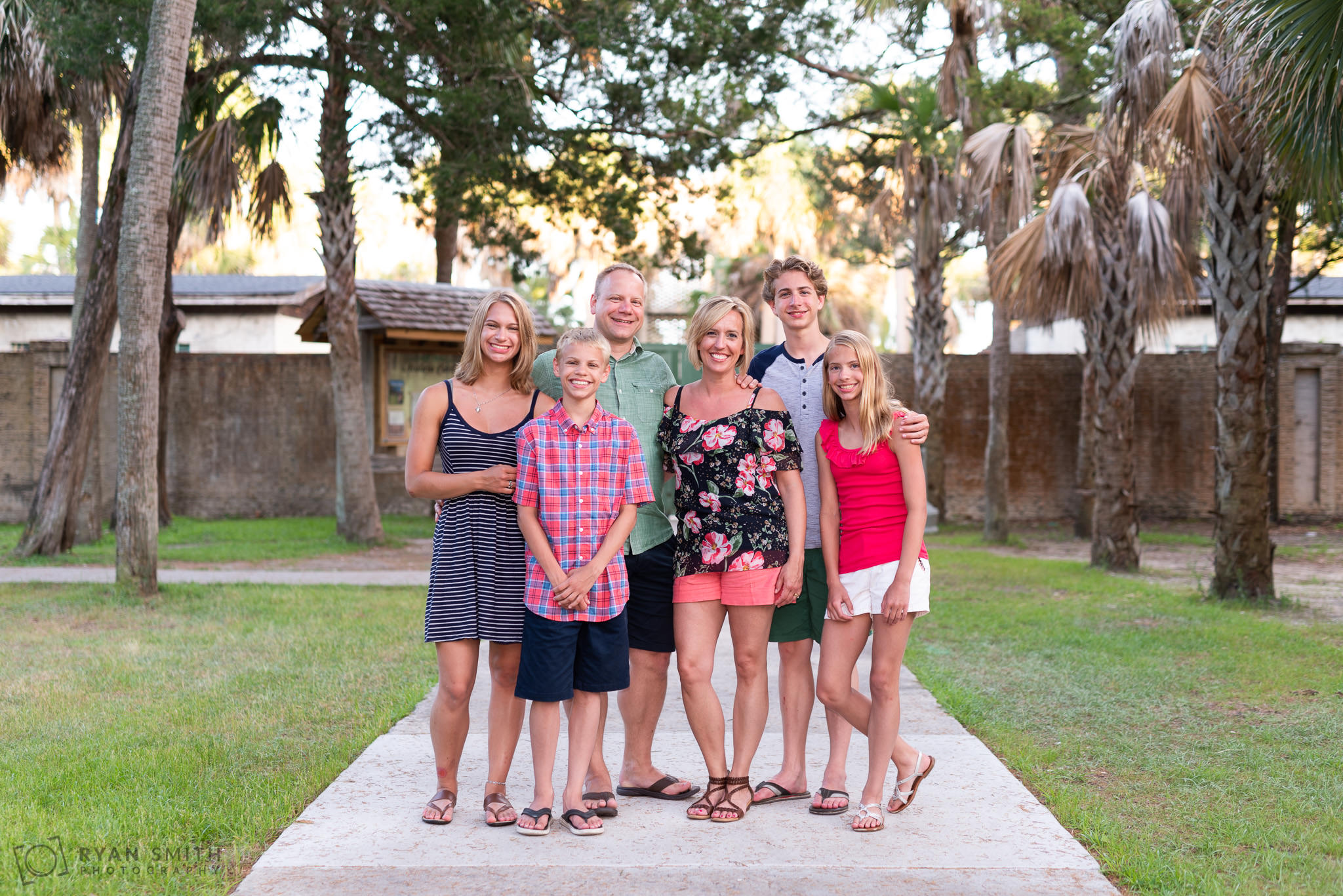 Family of 6 in front of the Atalaya Castle Huntington Beach State Park