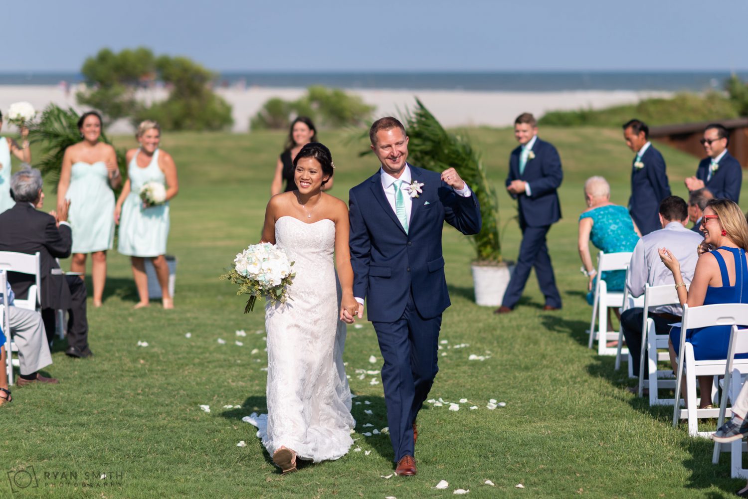 Happy bride and groom after the ceremony Dunes Golf and Beach Club