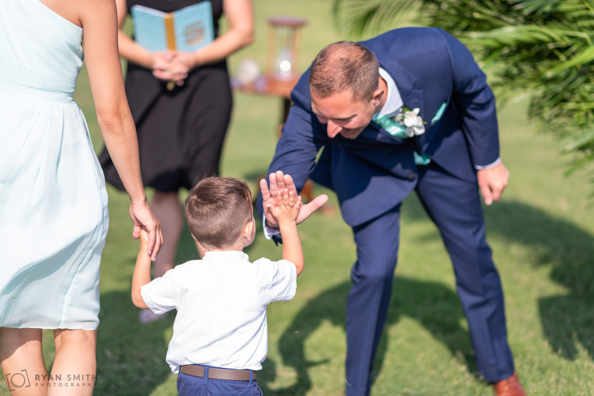 High five with groom Dunes Golf and Beach Club