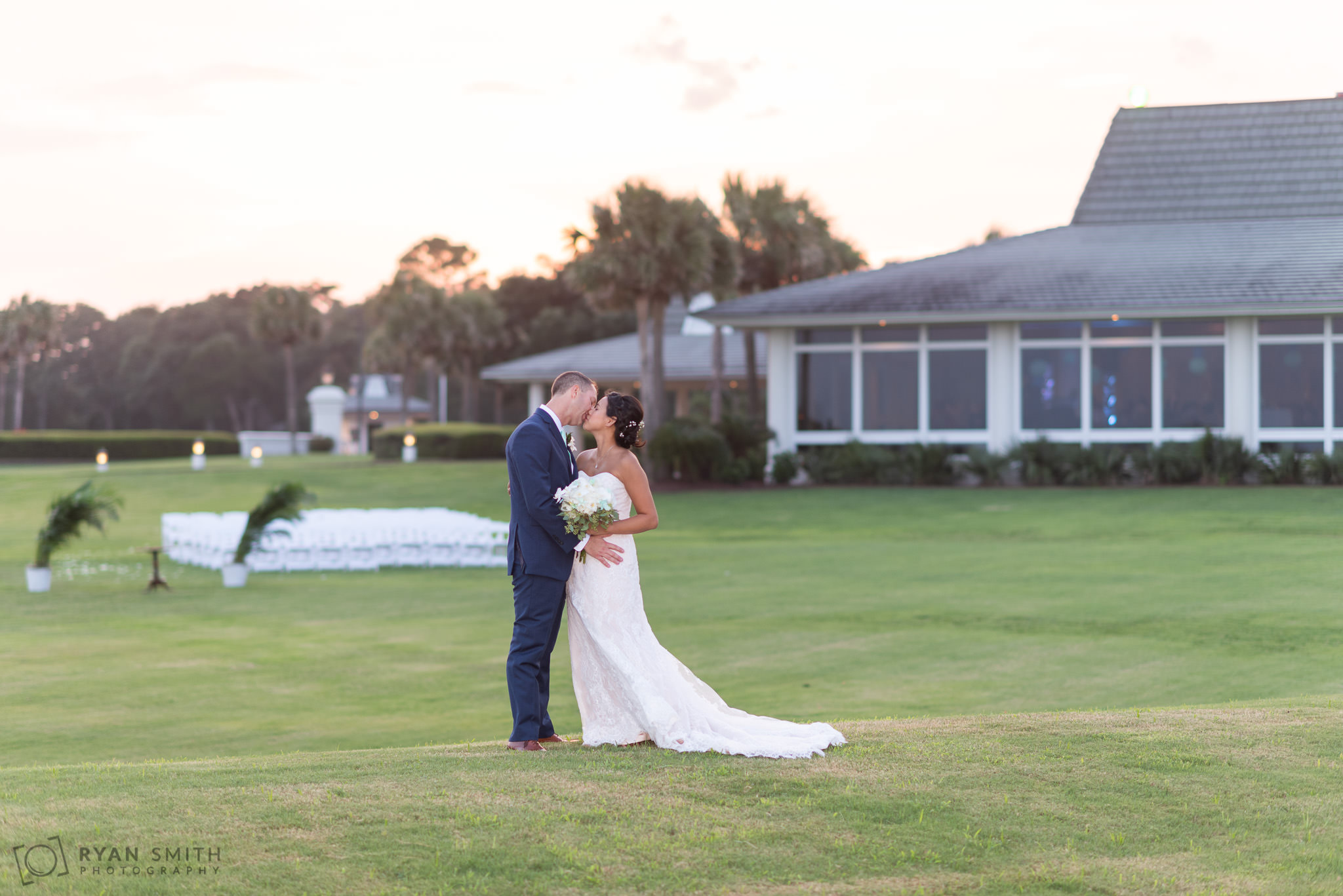 Kiss on the hill behind the clubhouse Dunes Golf and Beach Club