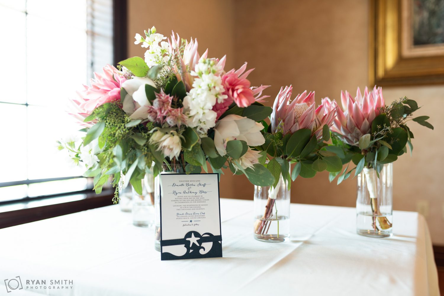 Bouquet with wedding invitation Grande Dunes Ocean Club