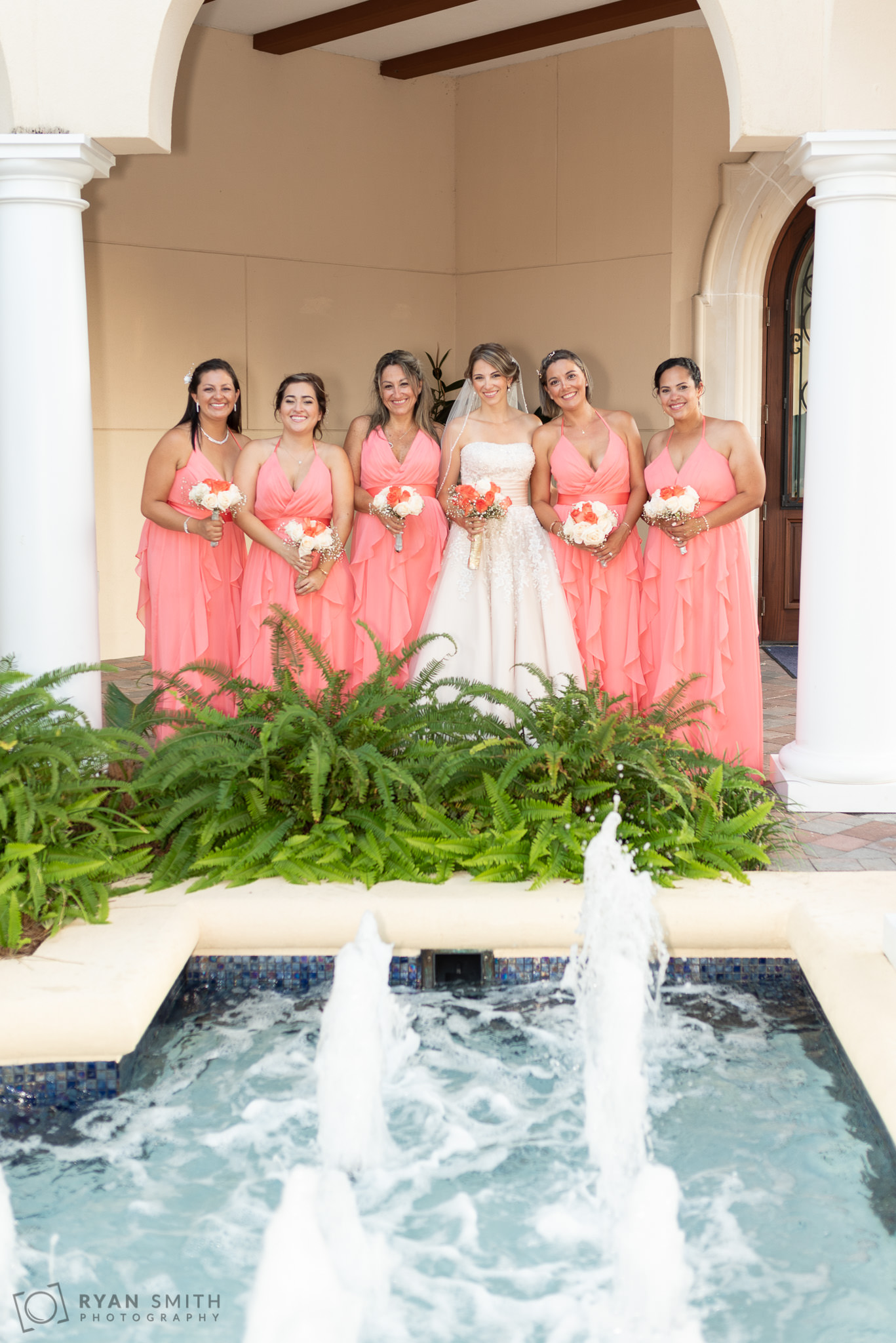 Bridal party by the fountains Grande Dunes Ocean Club