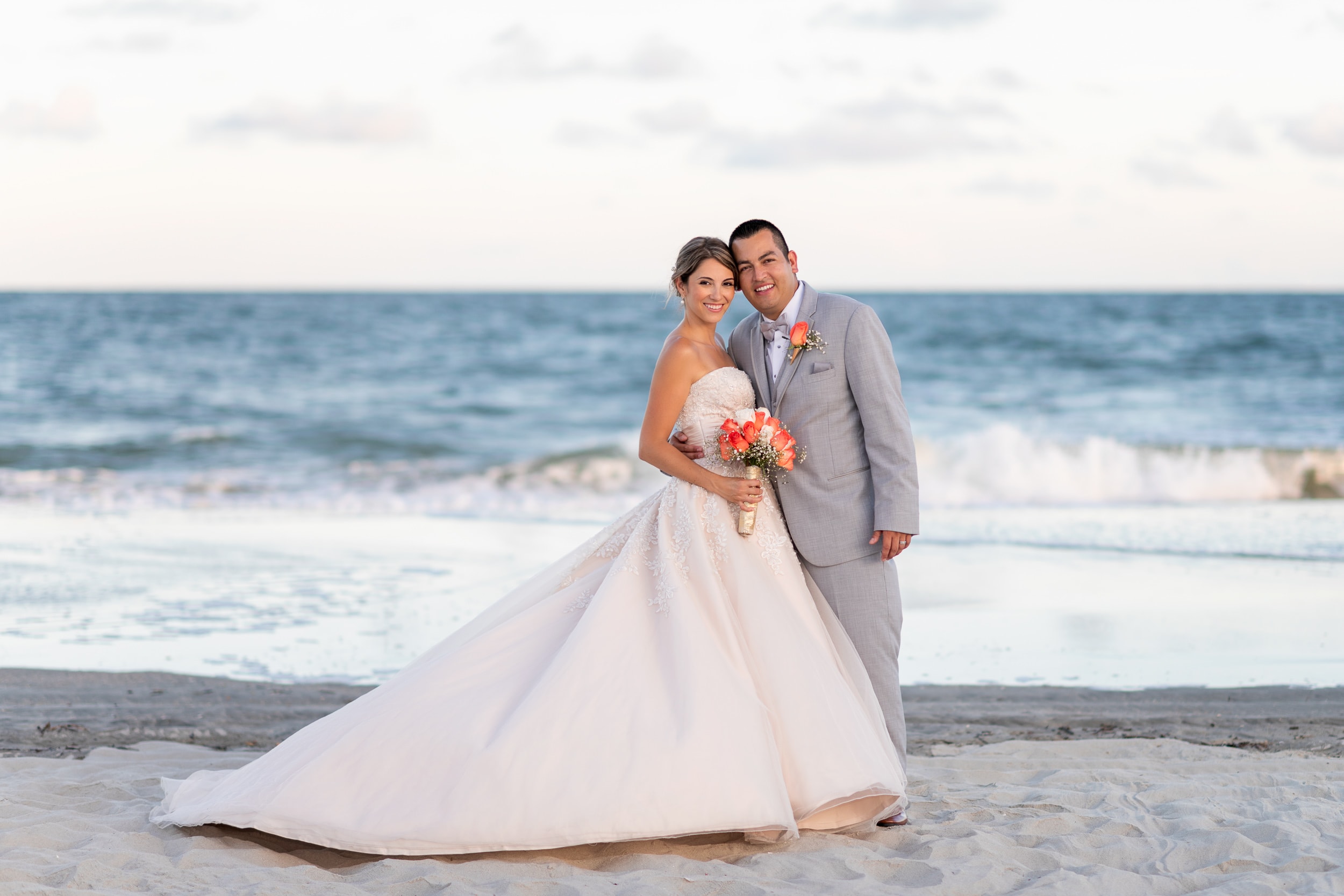 Bride and groom from Colombia by the ocean with a pretty sunset - Grande Dunes Ocean Club