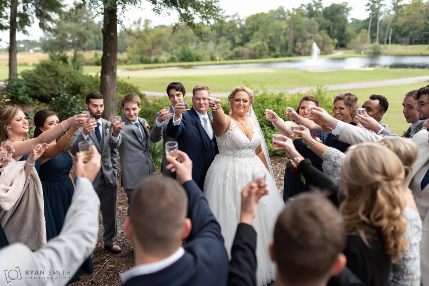 Bridal party having a toast