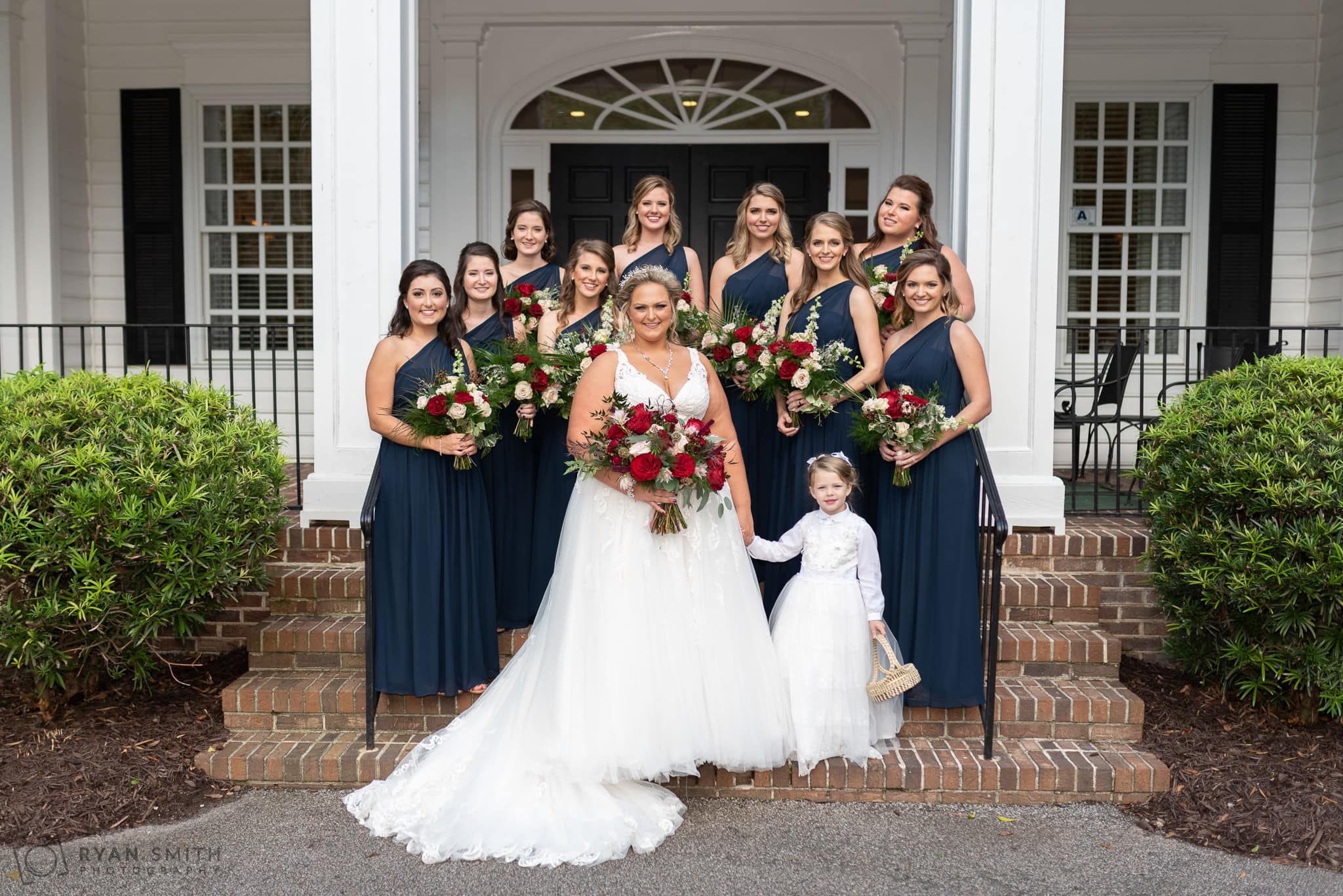 Bride and bridesmaids on the steps together