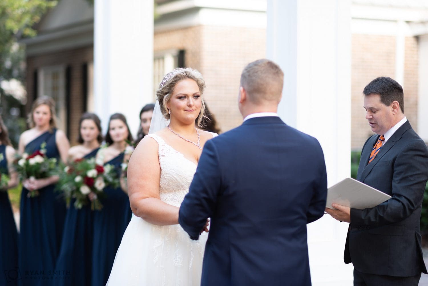 Bride looking at groom during vows