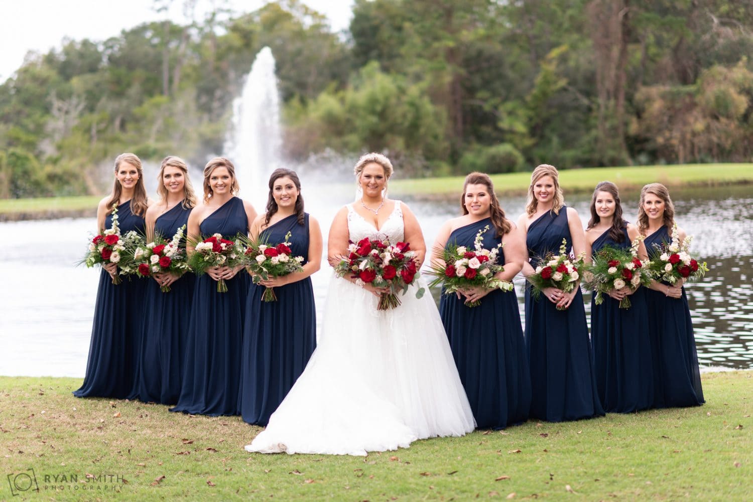 Bridesmaids in front of the lake