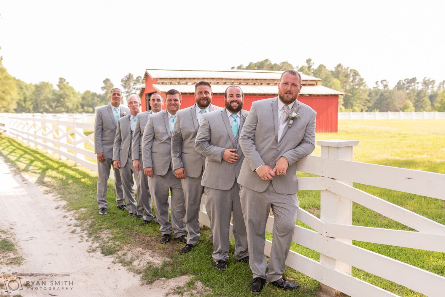 Groomsmen having out by the fence Wildberry Farm