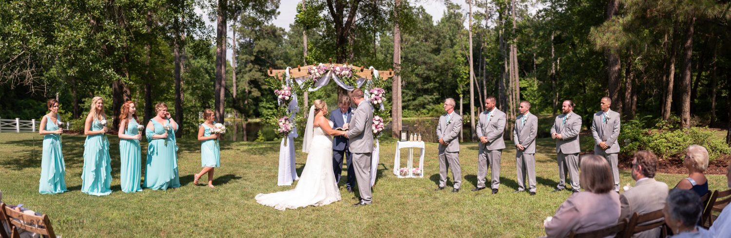 Panorama or wedding party during ceremony Wildberry Farm