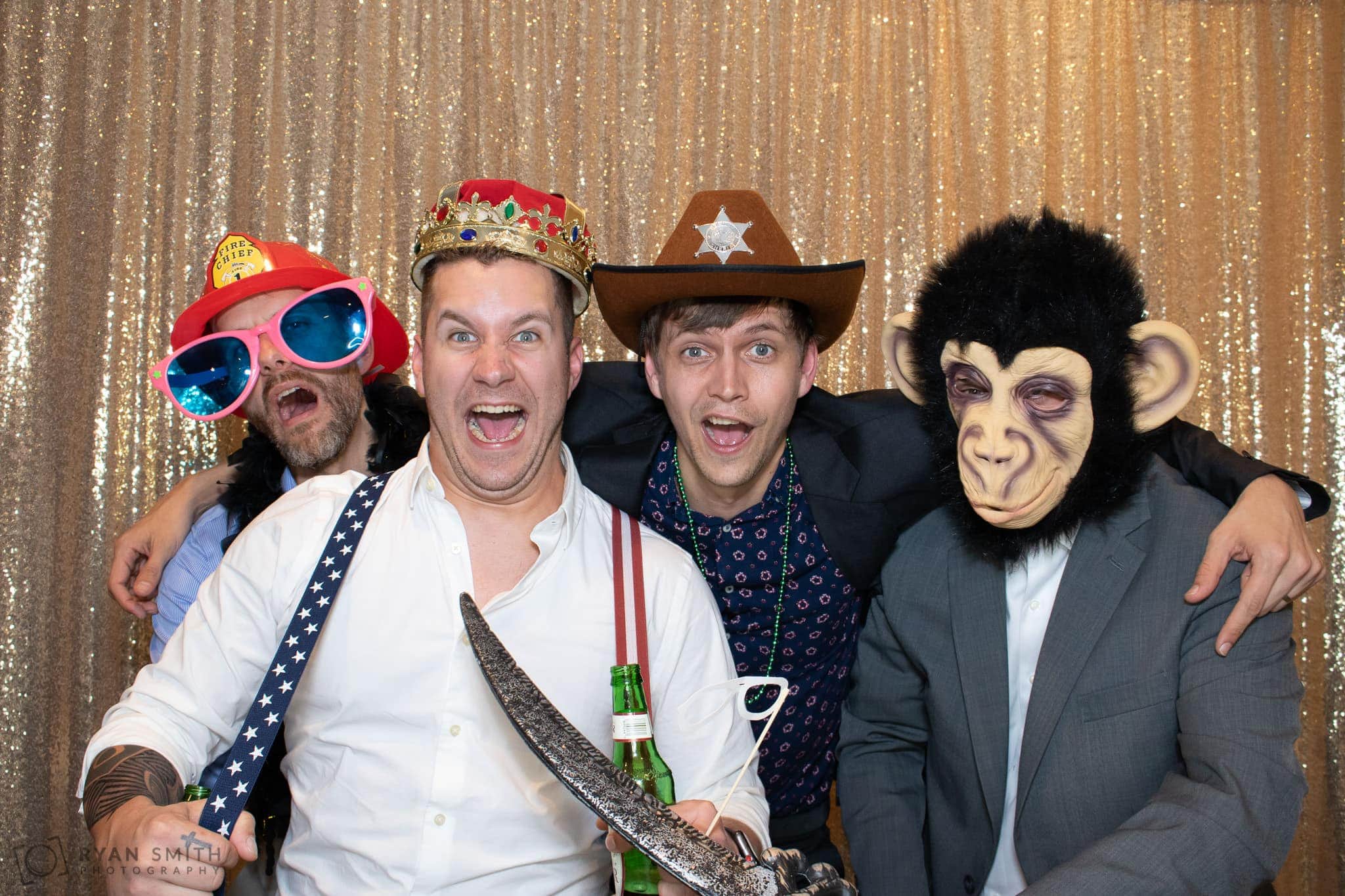 Photo Booth gold background at wedding -