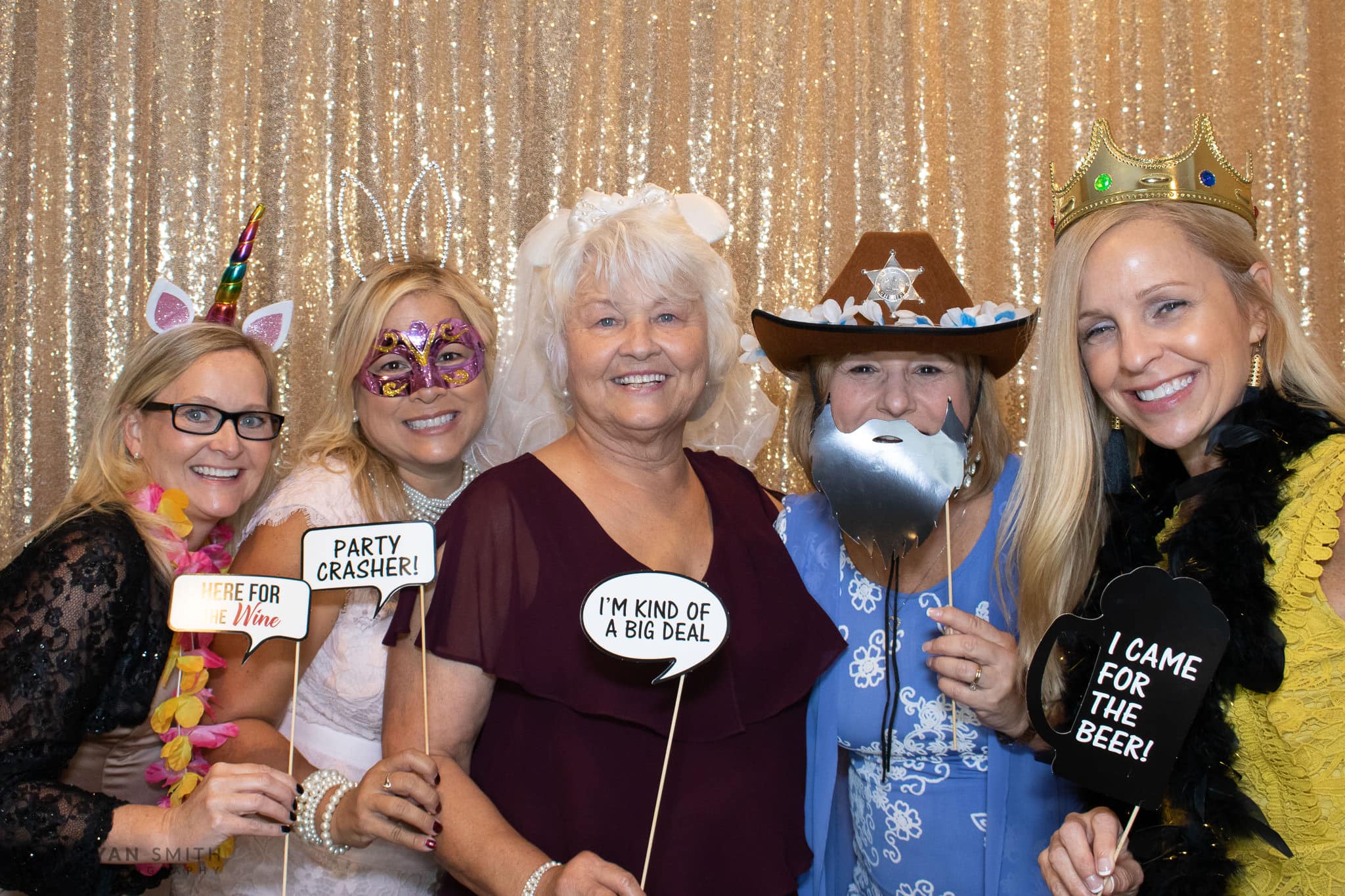 Photo Booth gold background at wedding