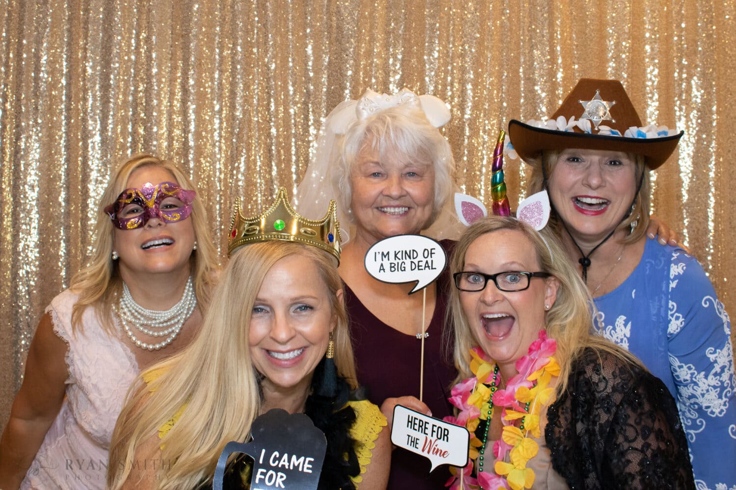 Photo Booth gold background at wedding -