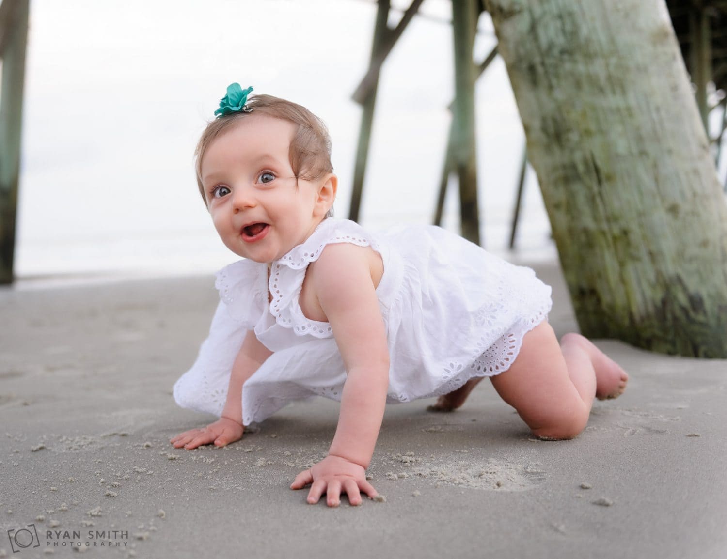 Baby girl crawling on the beach Myrtle Beach State Park