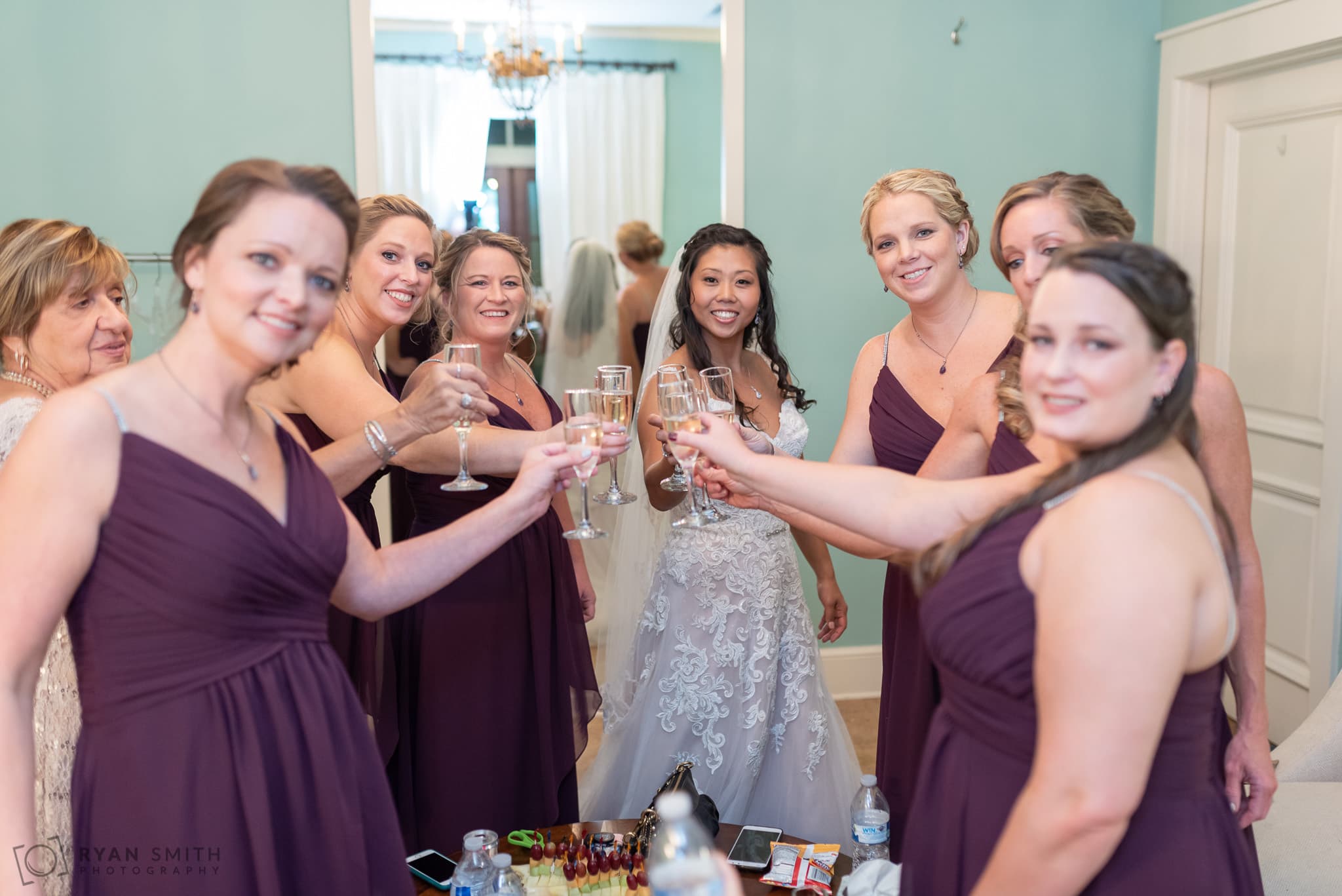 Bride and bridesmaids toasting before the wedding 21 Main Events at North Beach