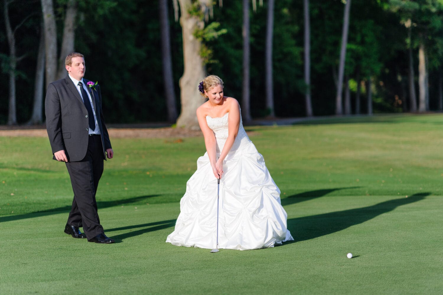 Bride golfing with groom - Pawelys Plantation