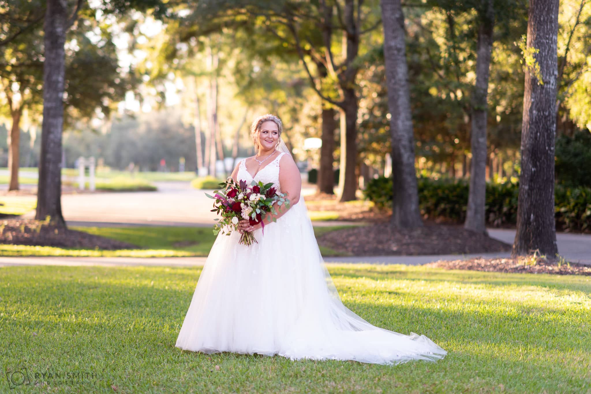 Bride in front of the clubhouse Pawleys Plantation Golf & Country Club