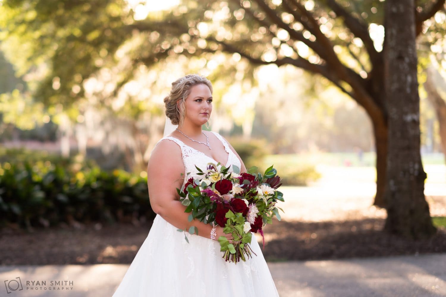Bride looking off into the distance Pawleys Plantation Golf & Country Club