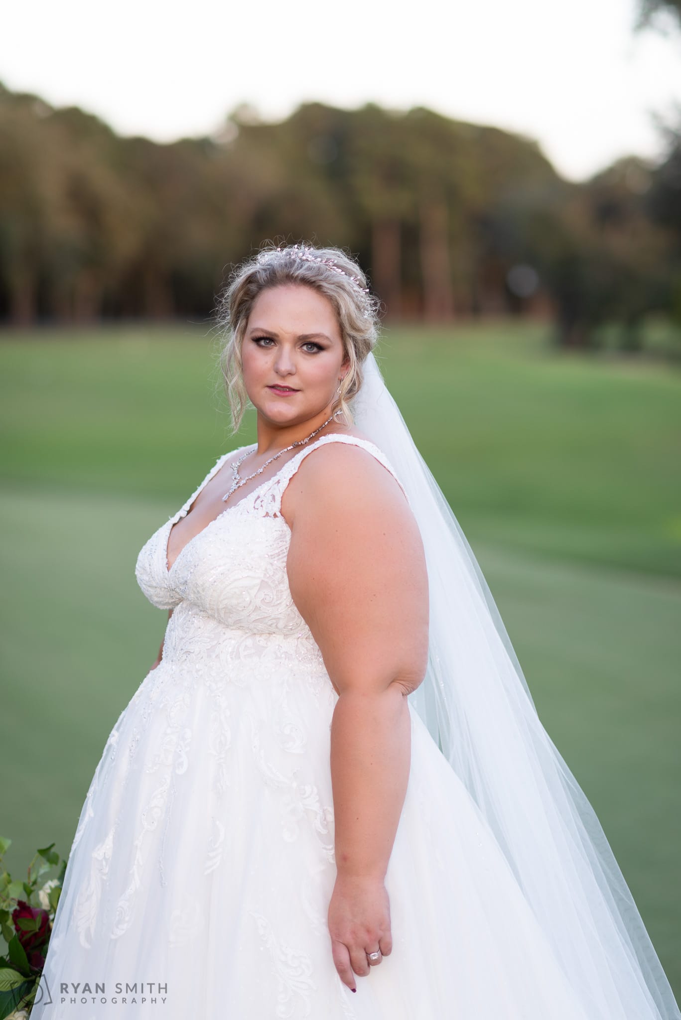 Bride looking over her shoulder Pawleys Plantation Golf & Country Club