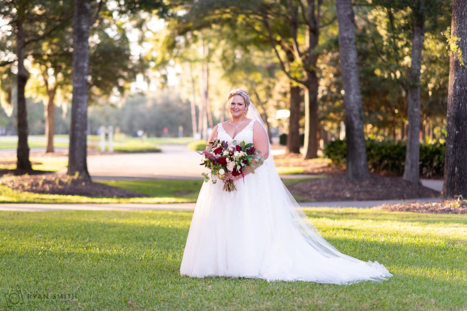 Bride standing on the front lawn Pawleys Plantation Golf & Country Club