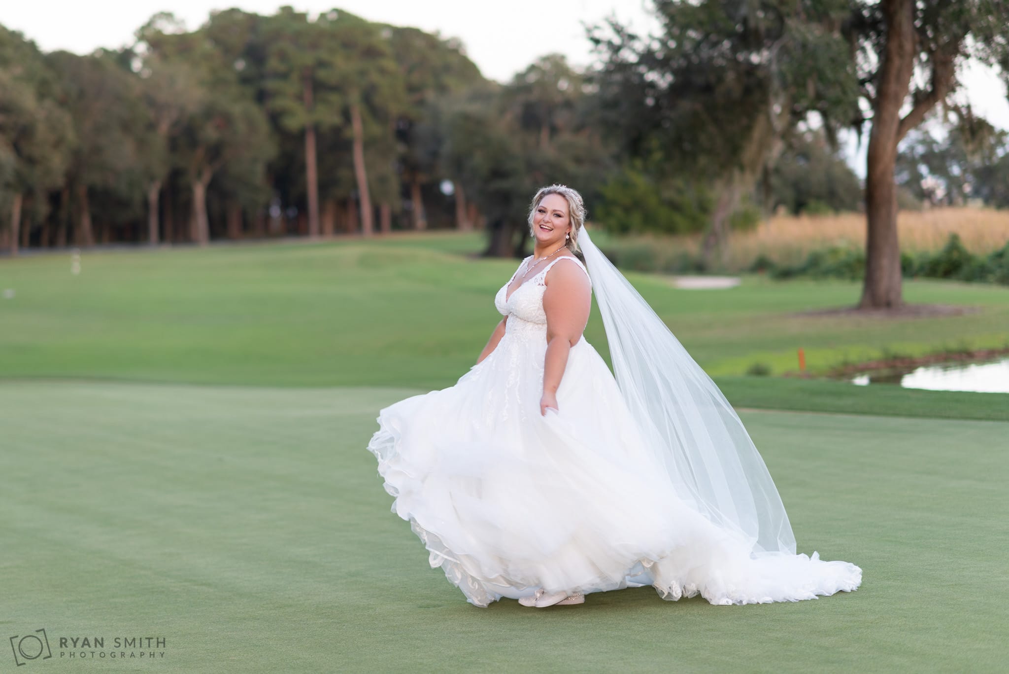 Bride twirling her dress Pawleys Plantation Golf & Country Club