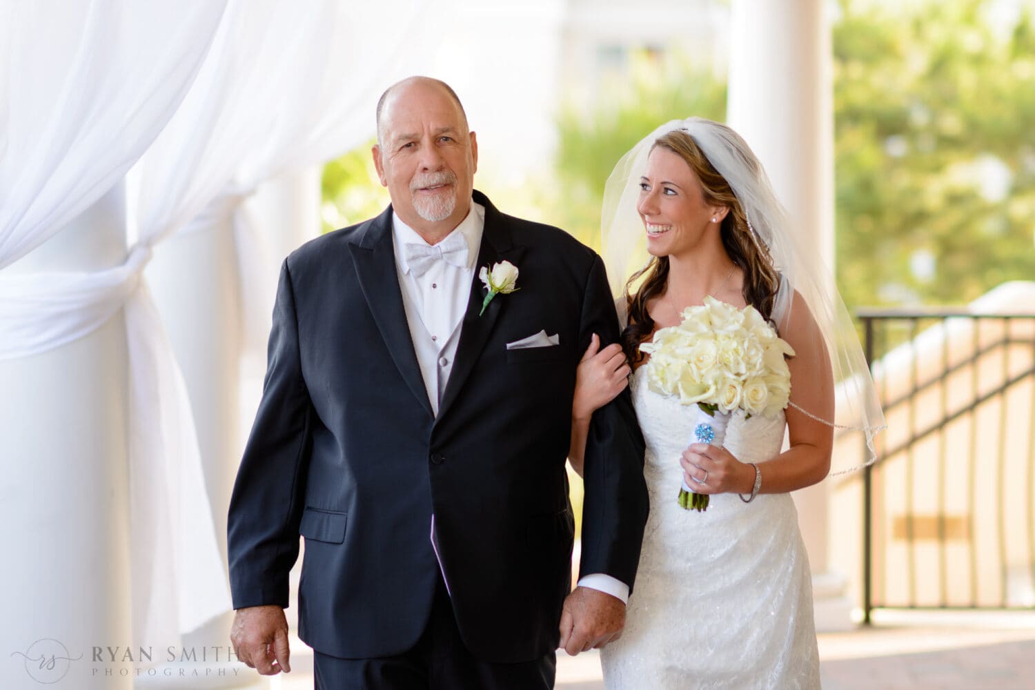 Bride walking with father down the Isle - Ocean Club - Myrtle Beach
