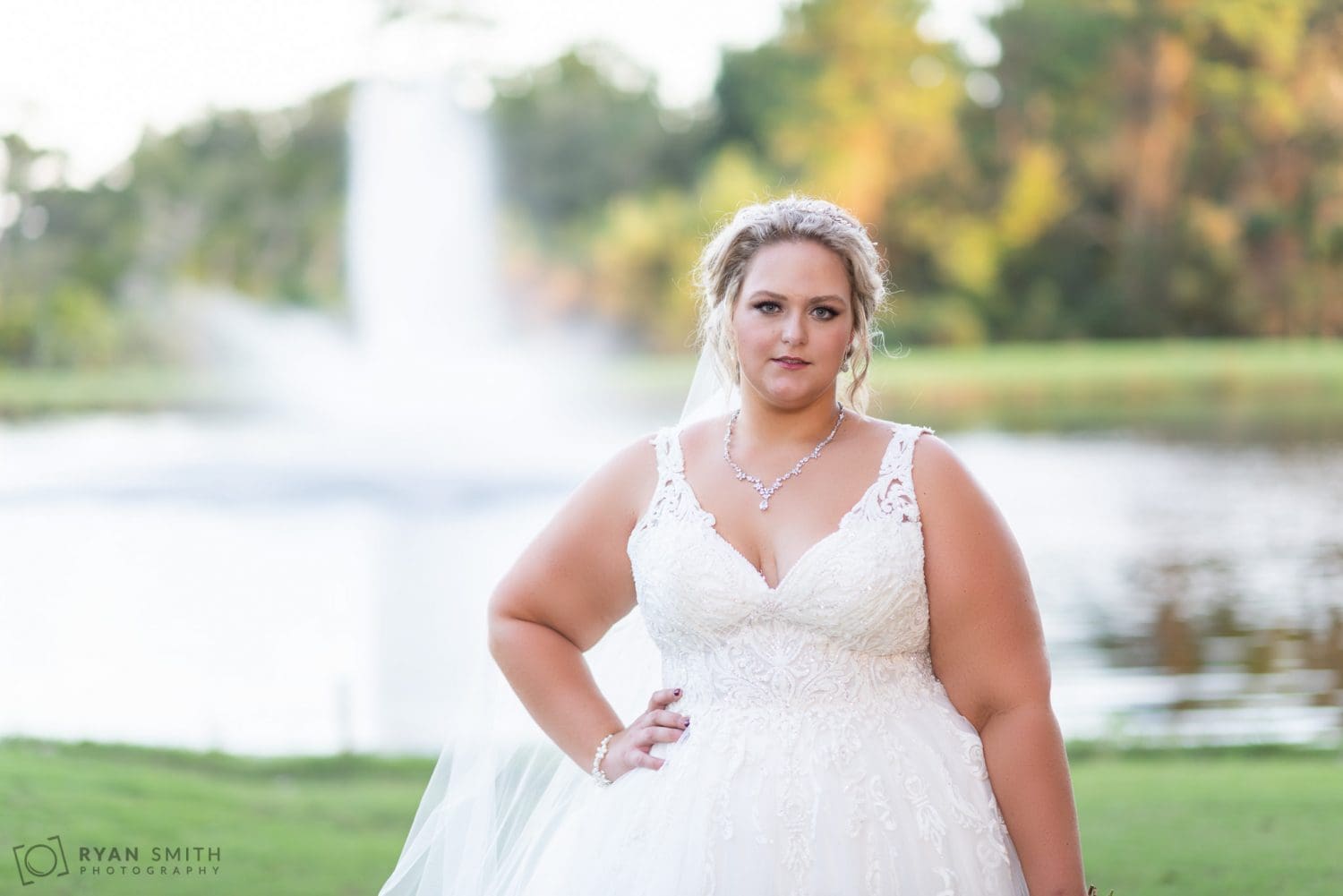Close-up of bride in front of the fountain Pawleys Plantation Golf & Country Club