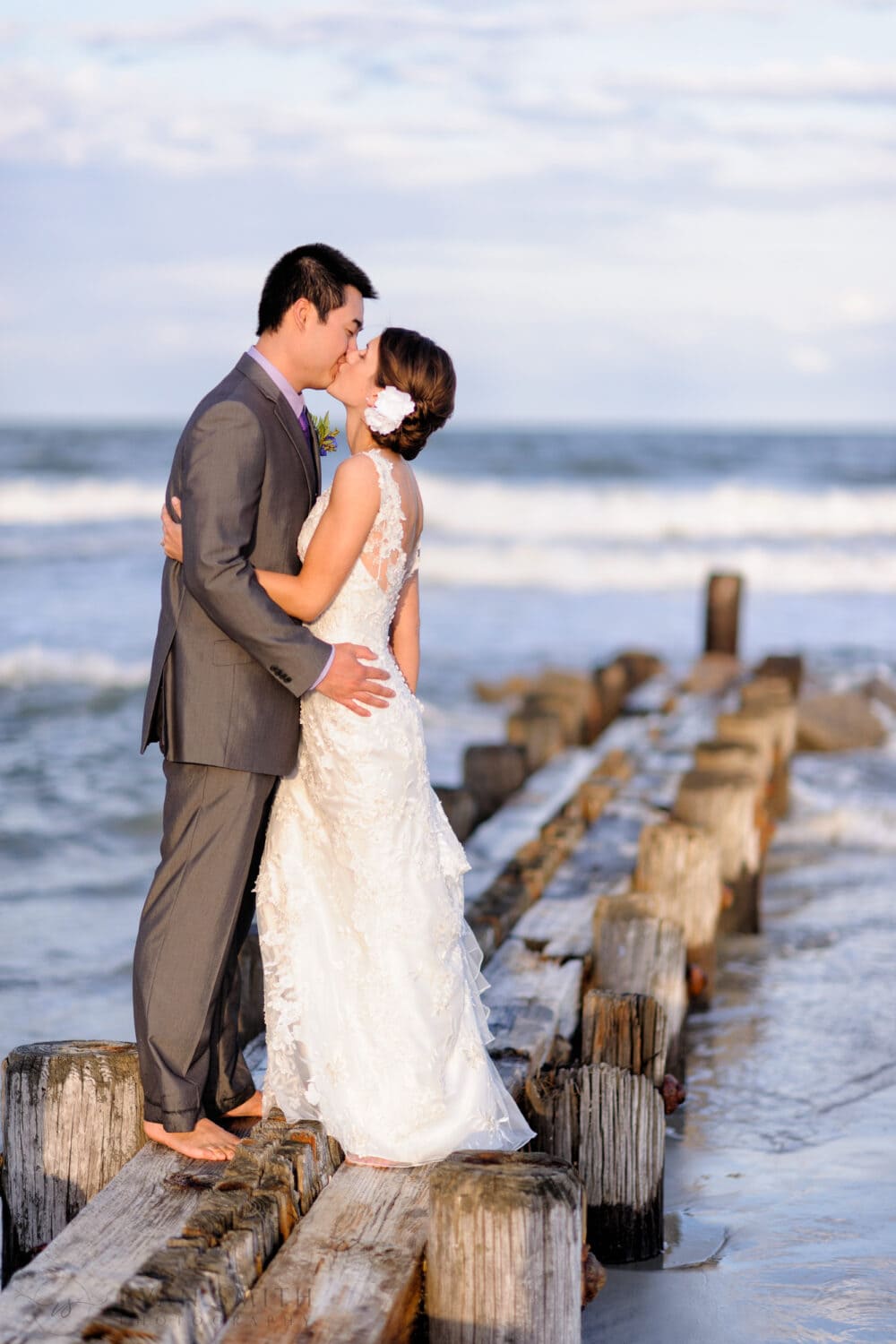 Couple kissing on a beach jetty - Murrells Inlet