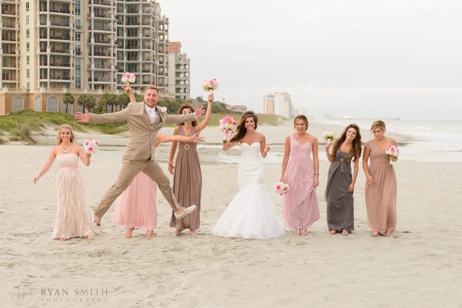 Groom photobombing the bridesmaids on the beach - Myrtle Beach