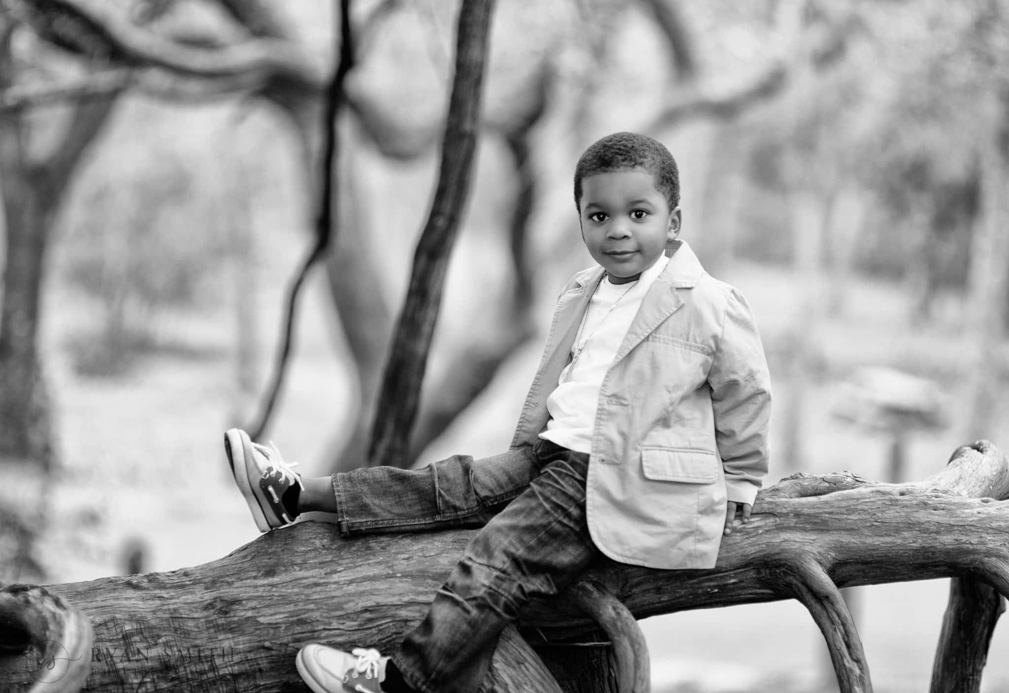 Little boy sitting on an oak tree - Myrtle Beach State Park