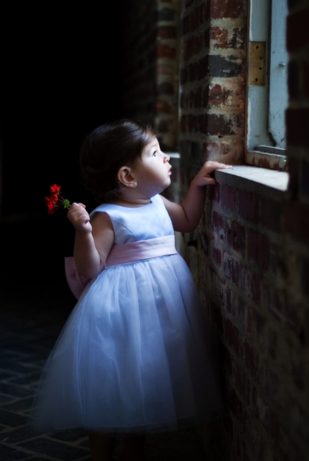 Little girl holding a flower - Atalaya Castle