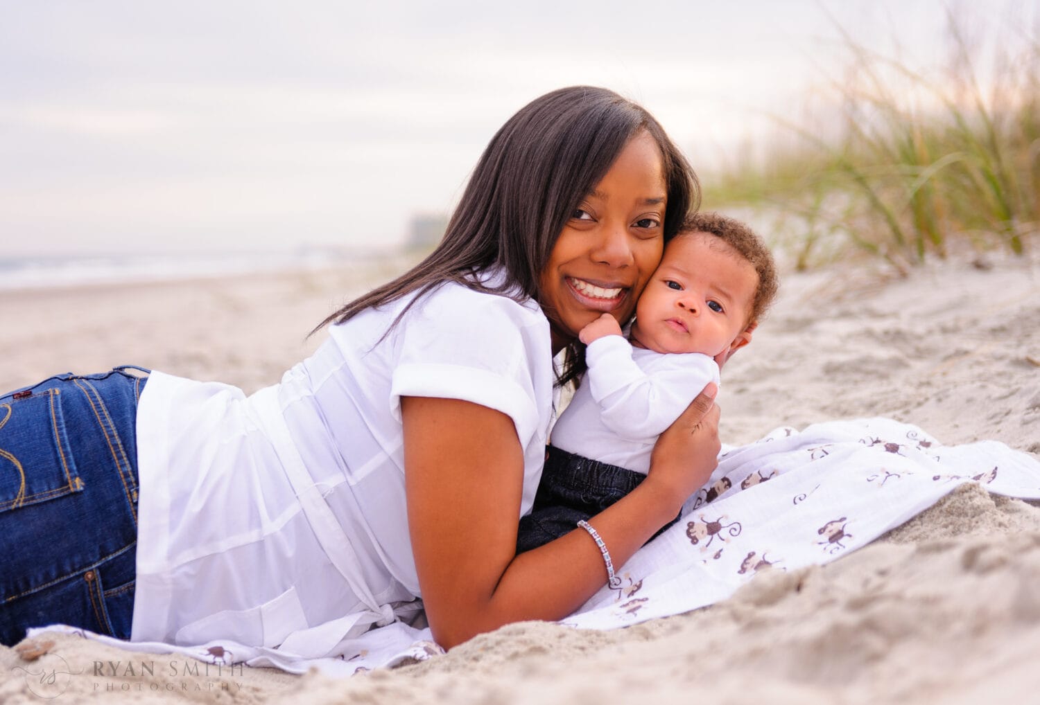Mom and baby laying by the dunes - Myrtle Beach State Park