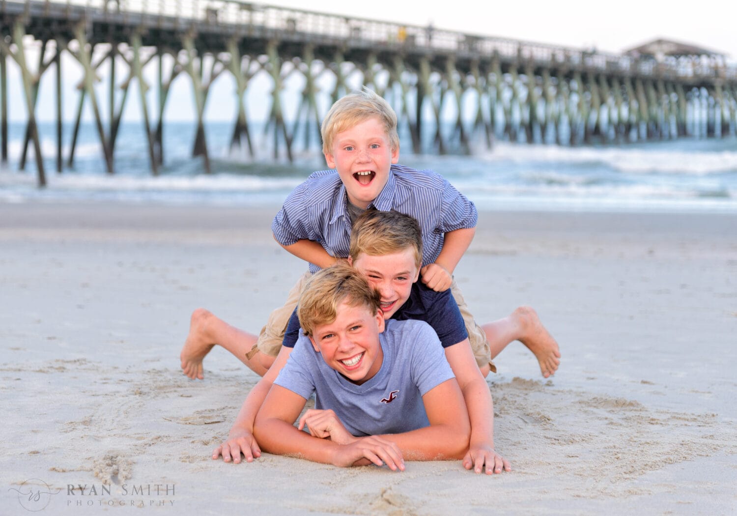 Three brothers on each other backs - Myrtle Beach State Park