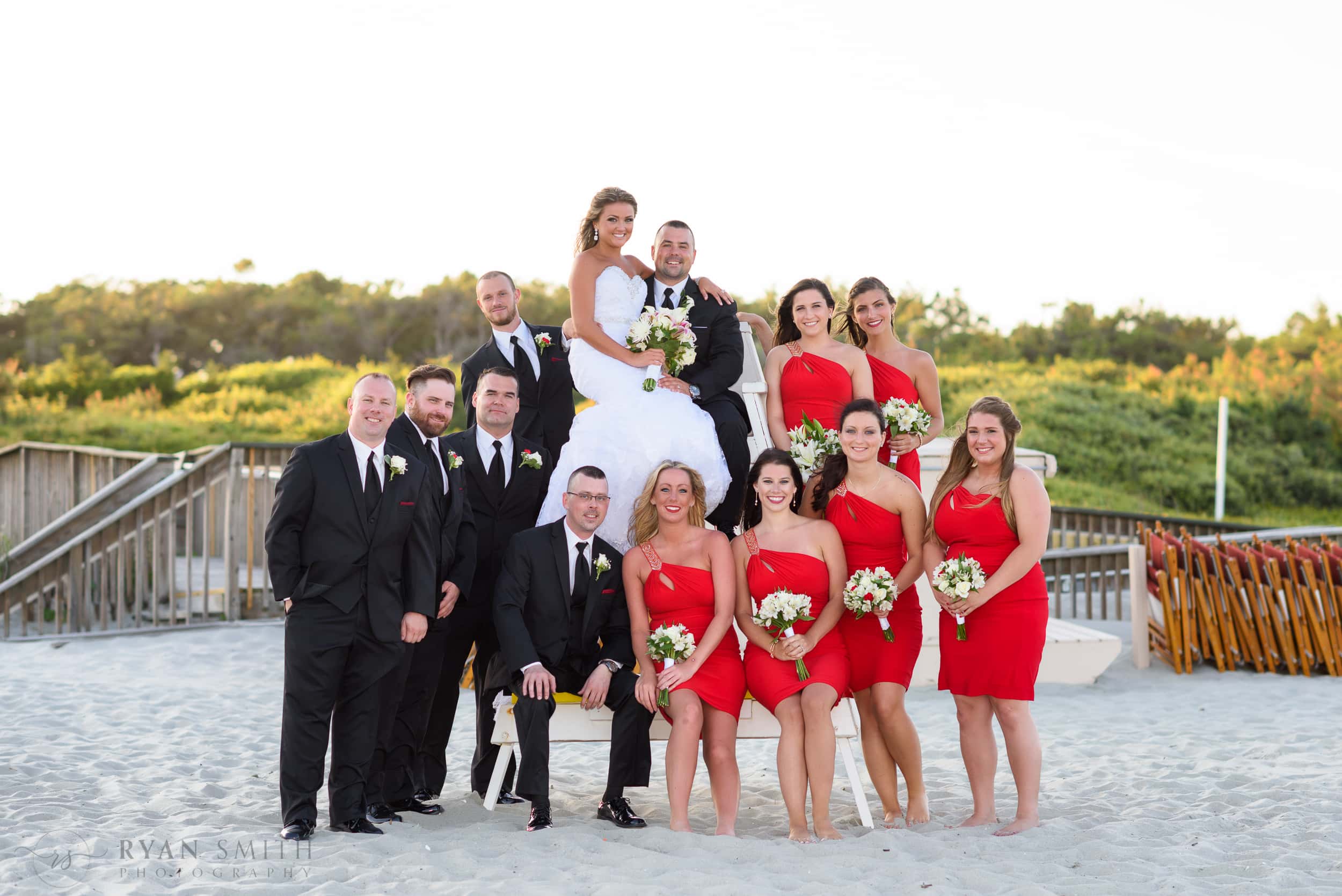 Wedding party sitting on a lifeguard stand - Myrtle Beach
