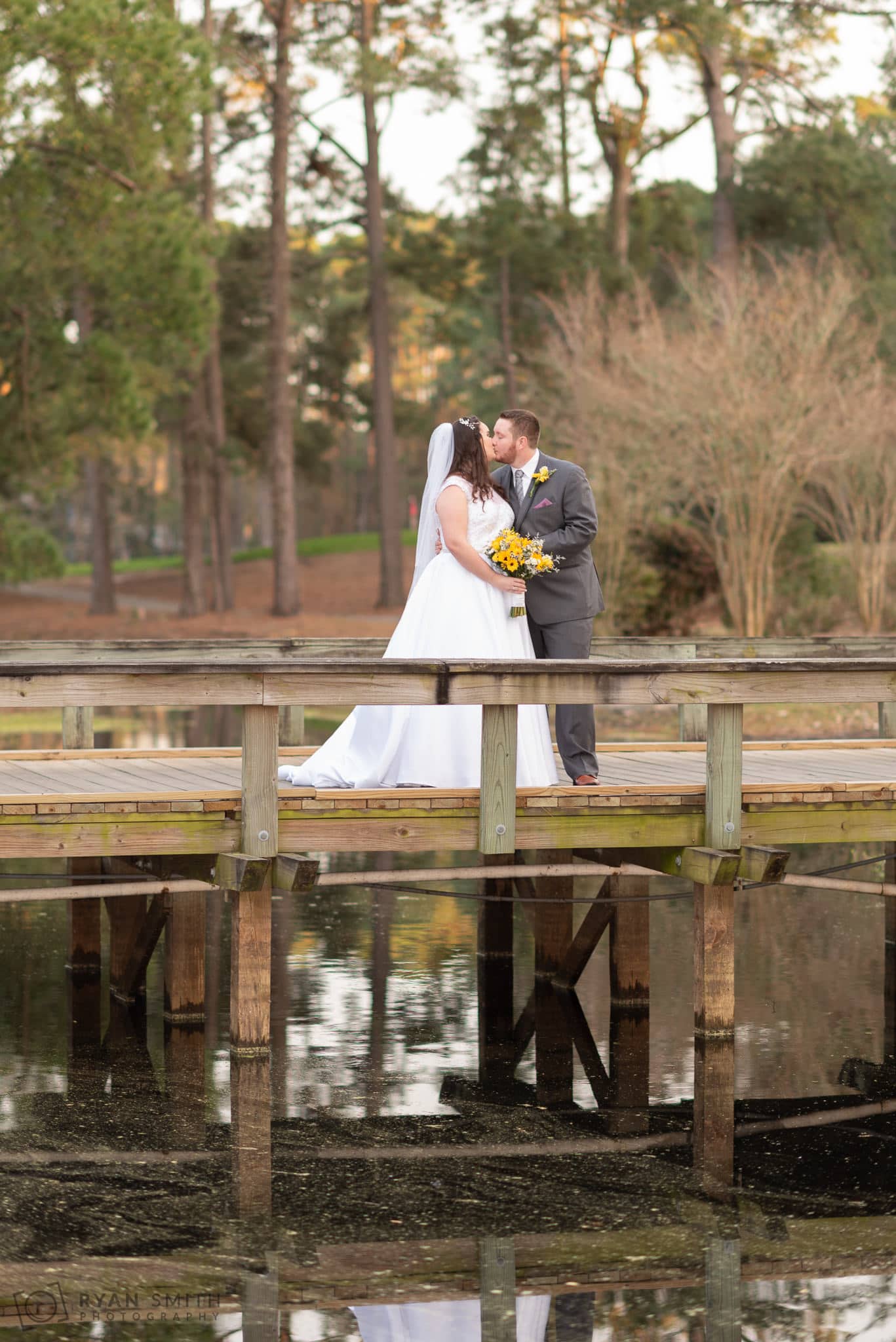 Bride and groom on the bridge Litchfield Country Club