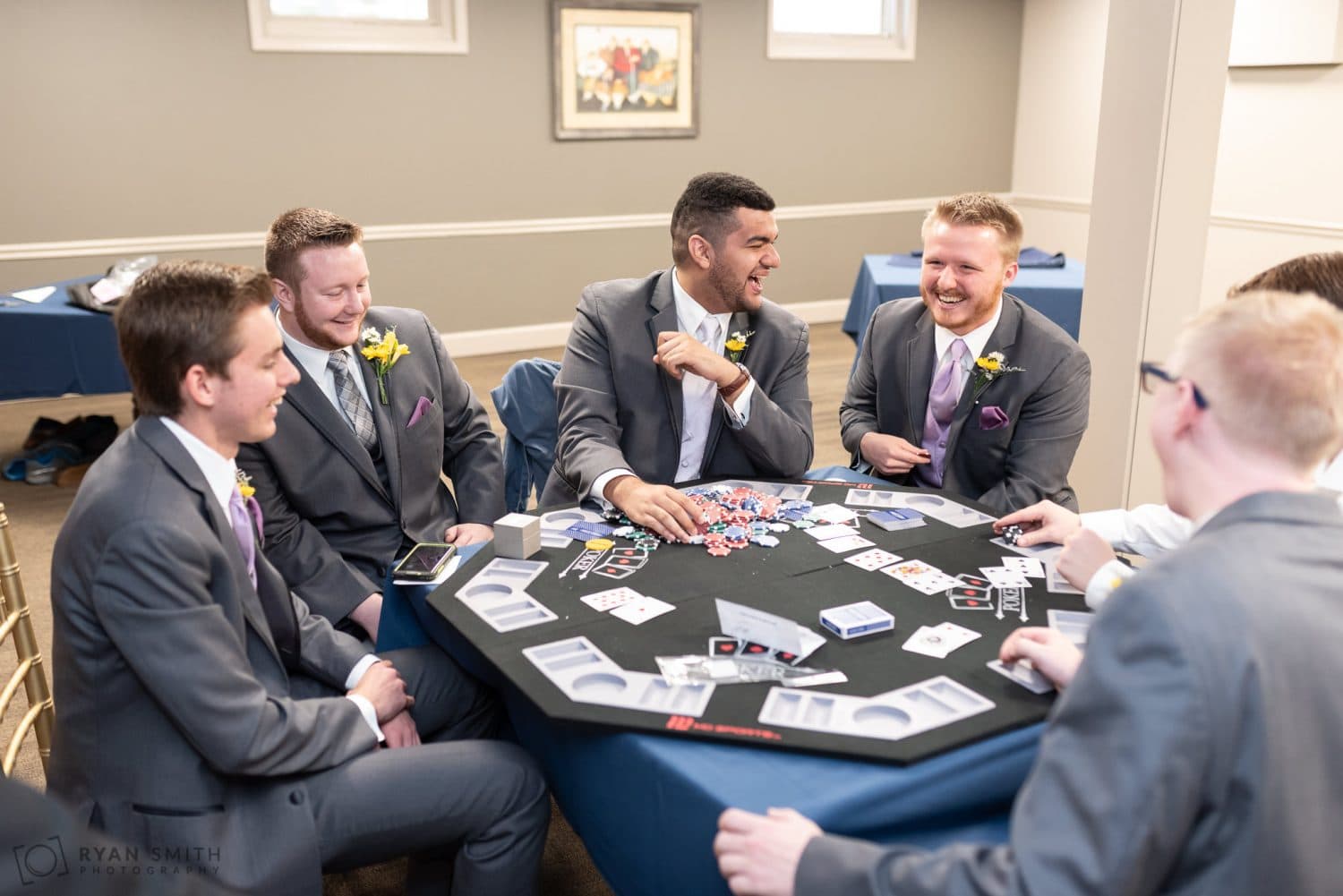 Guys playing poker before the ceremony Litchfield Country Club