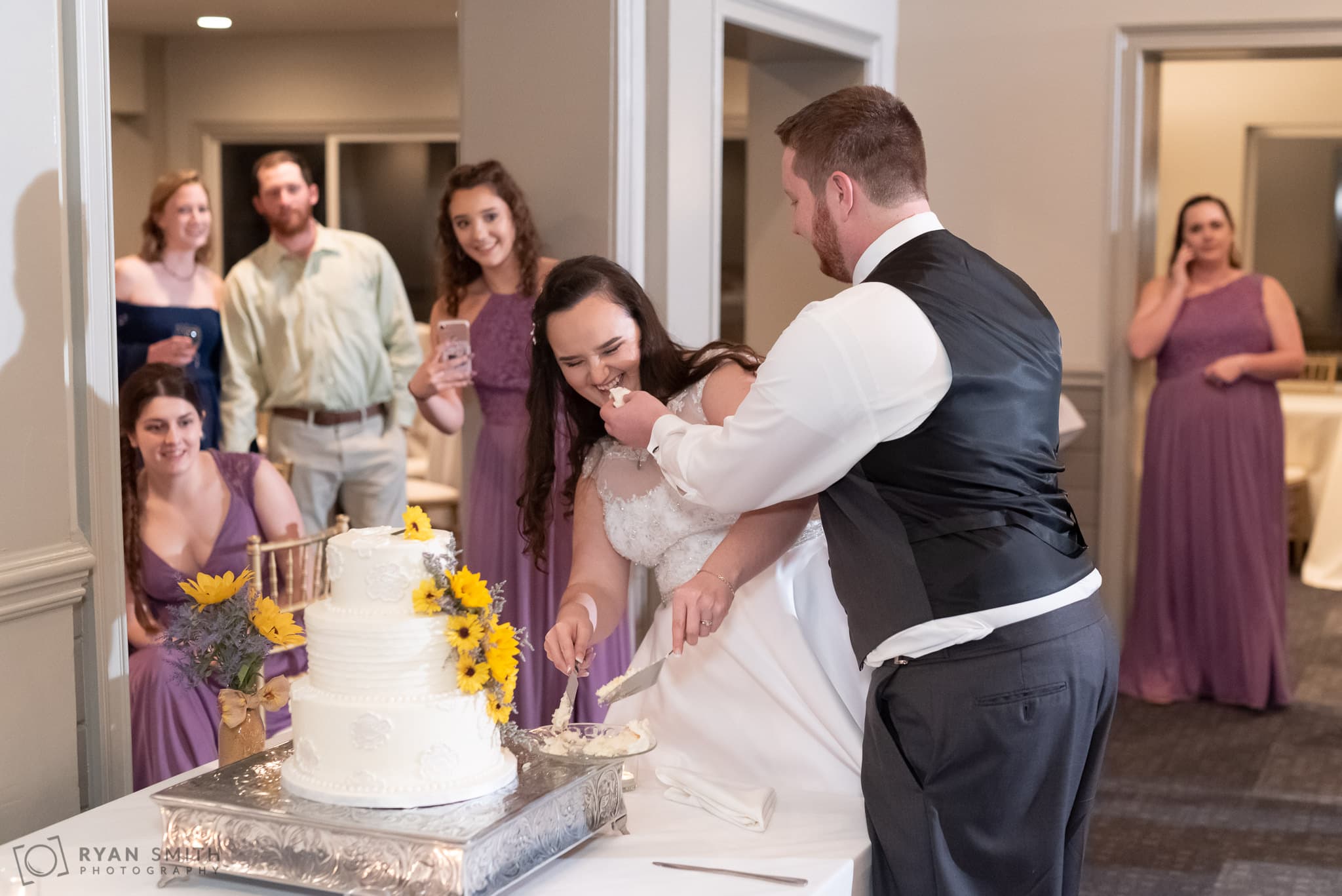 Having fun during cake cutting Litchfield Country Club