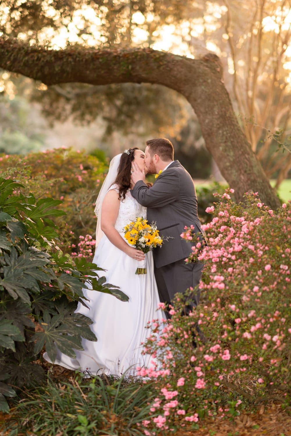 Kiss in the flowers at sunset Litchfield Country Club