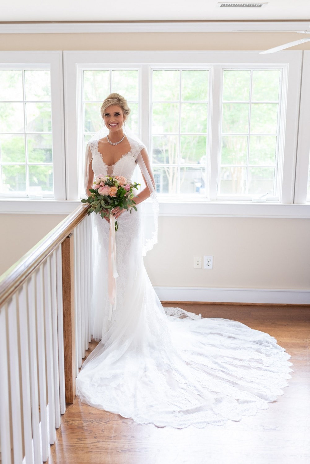 Bride standing at the top of the stairs - Brookgreen Gardens