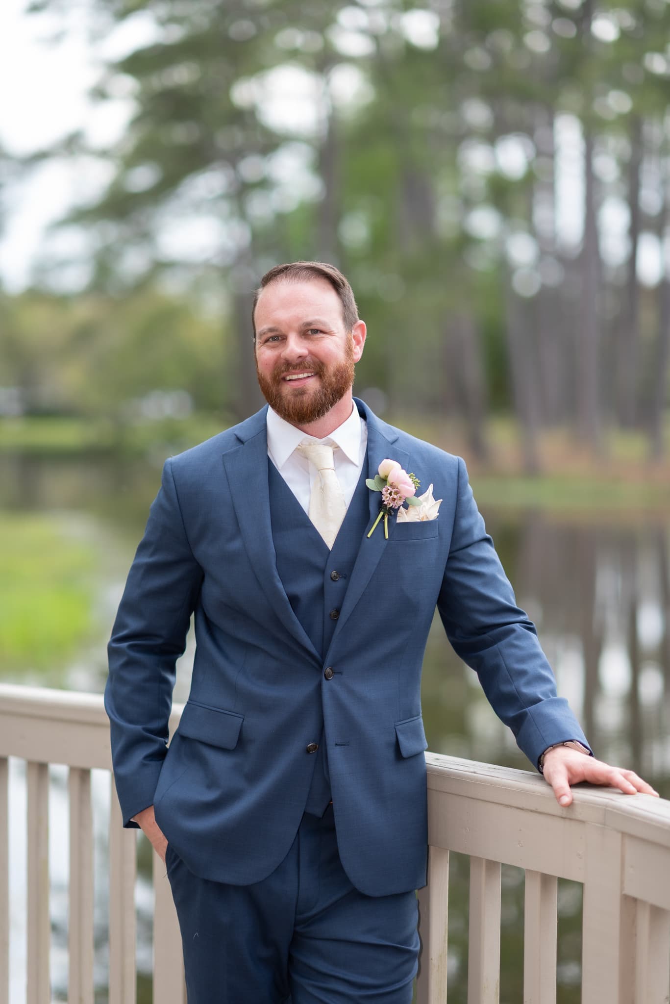 Groom standing on the dock before the ceremony - Brookgreen Gardens