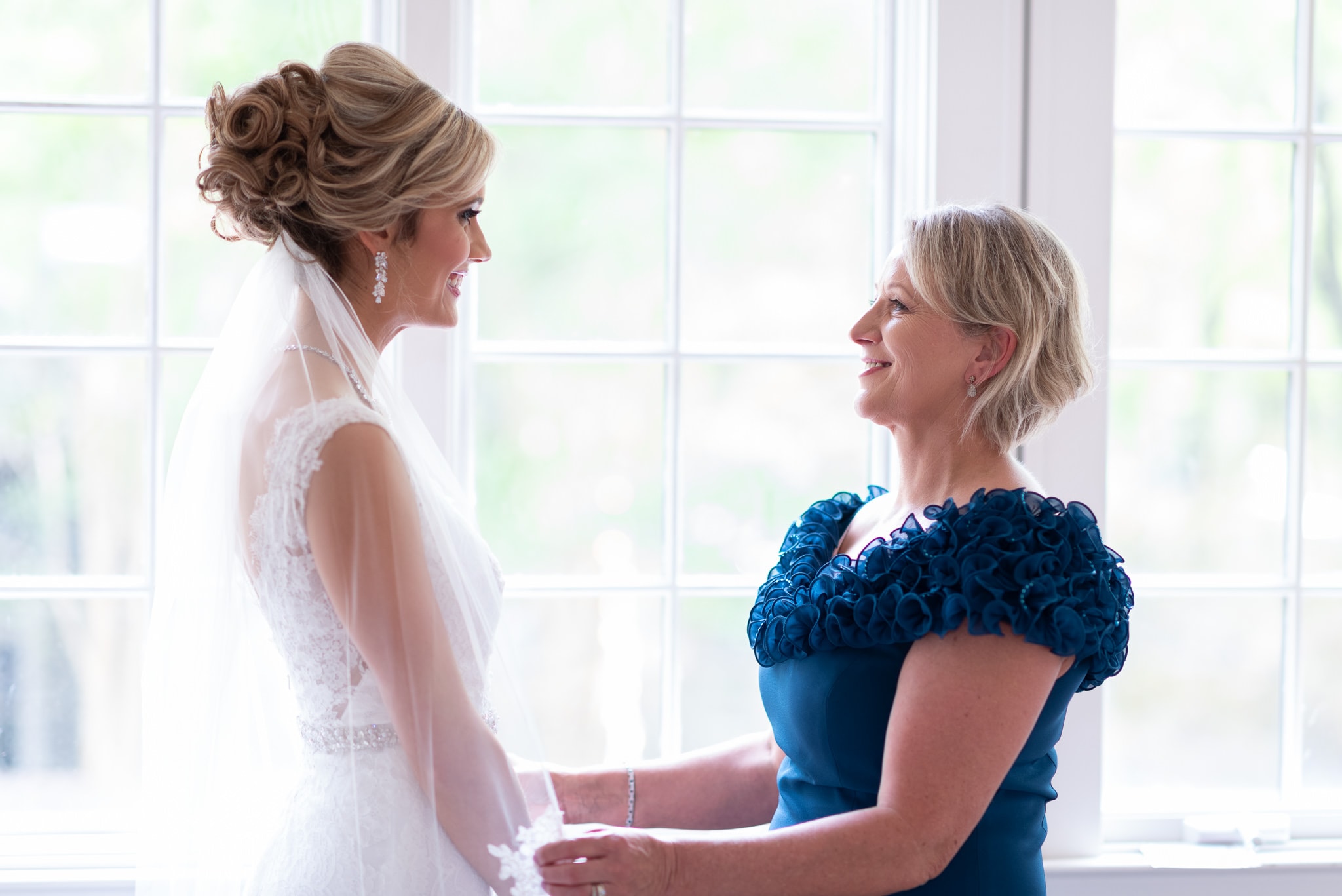 Mother checking out bride before the ceremony - Brookgreen Gardens