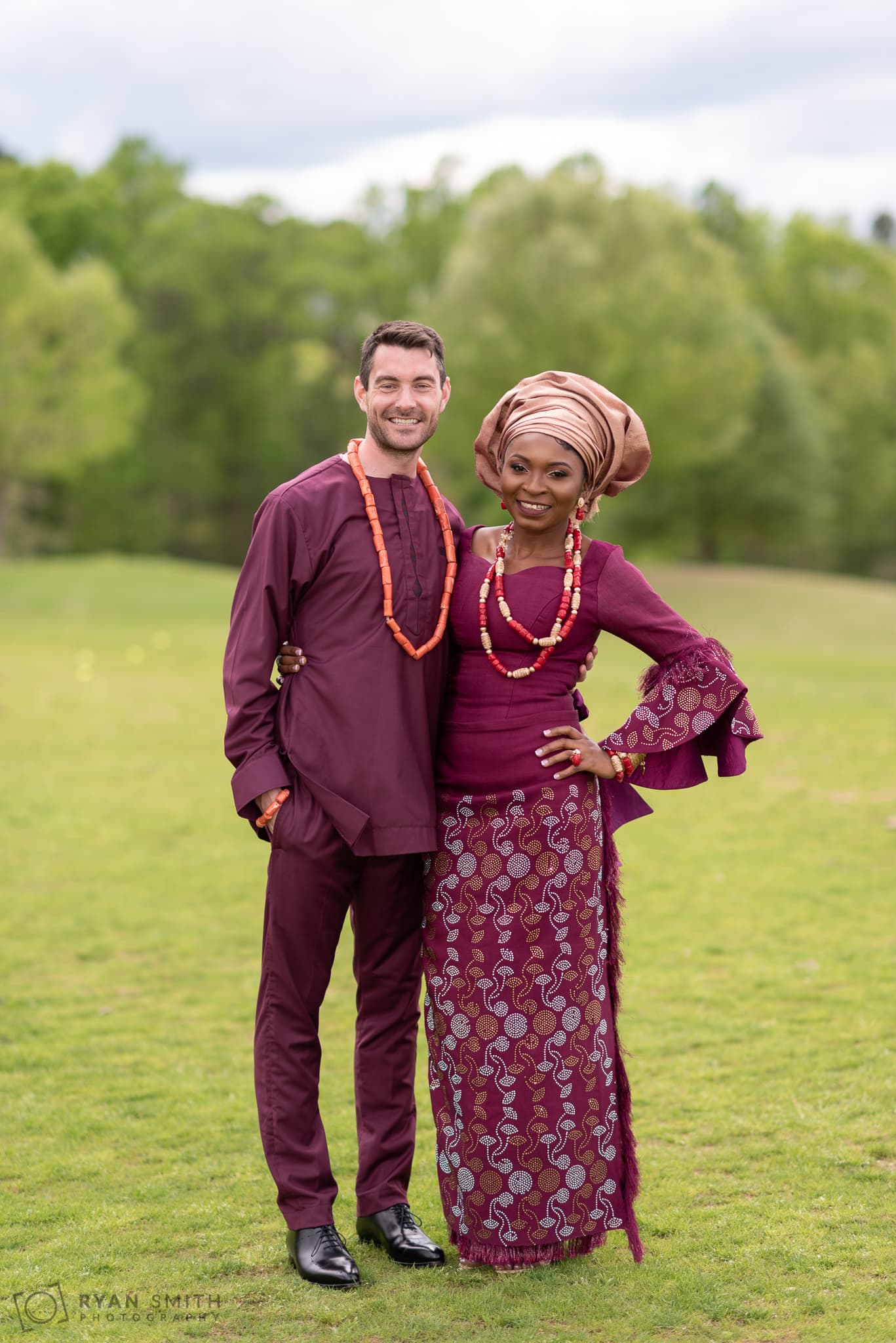 Bride and groom in traditional African wedding attire River Ridge Golf Club