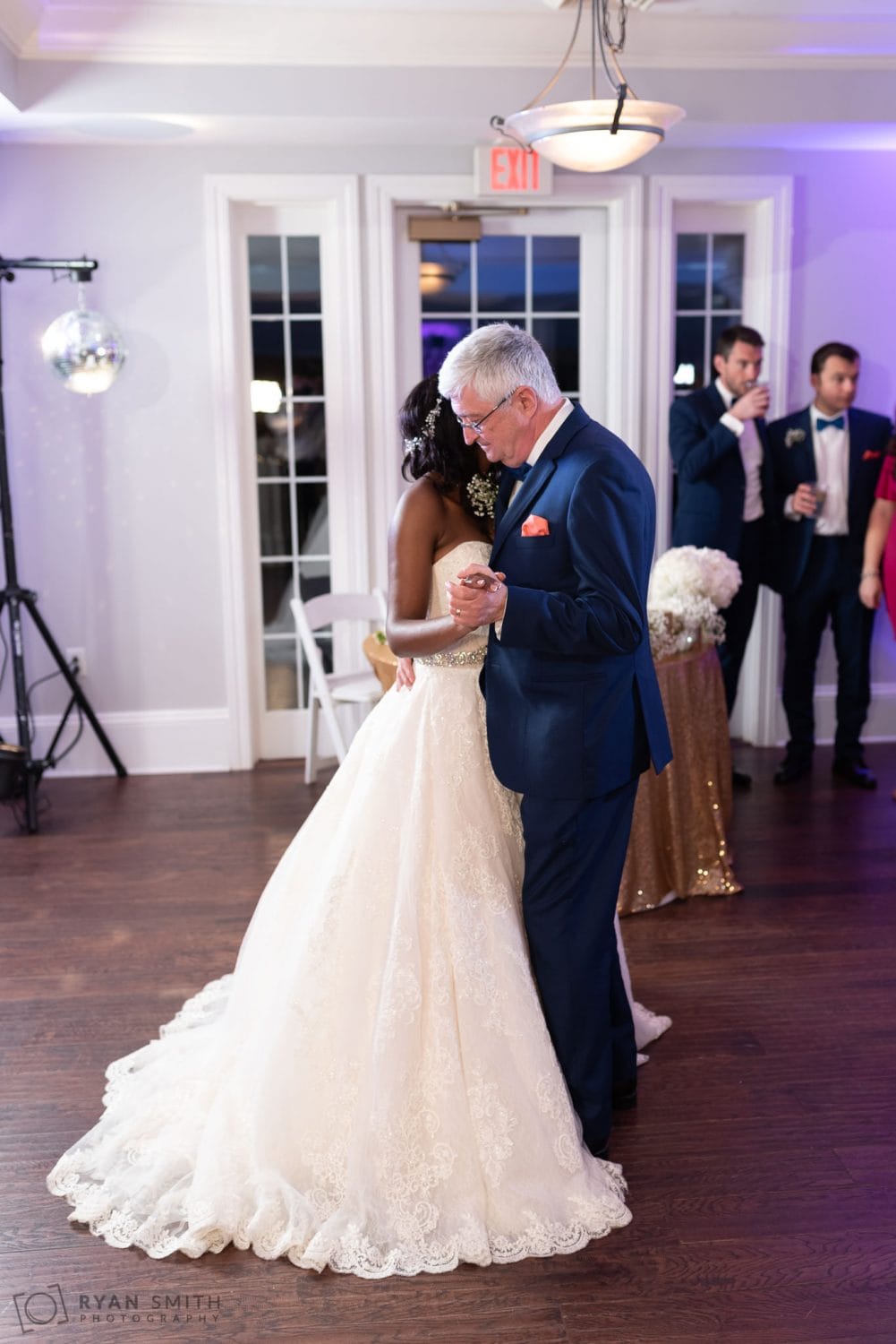 Bride dancing with groom's father River Ridge Golf Club