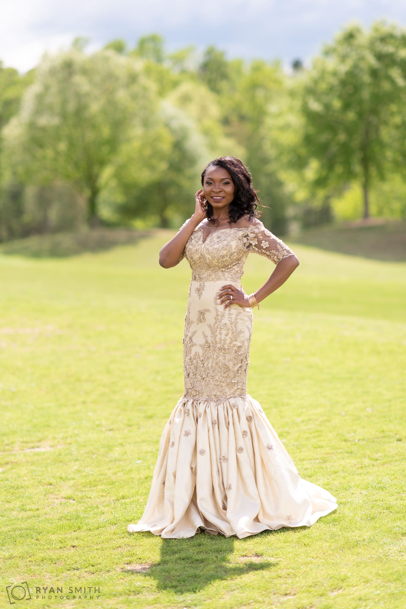 Bride posing in African wedding dress River Ridge Golf Club