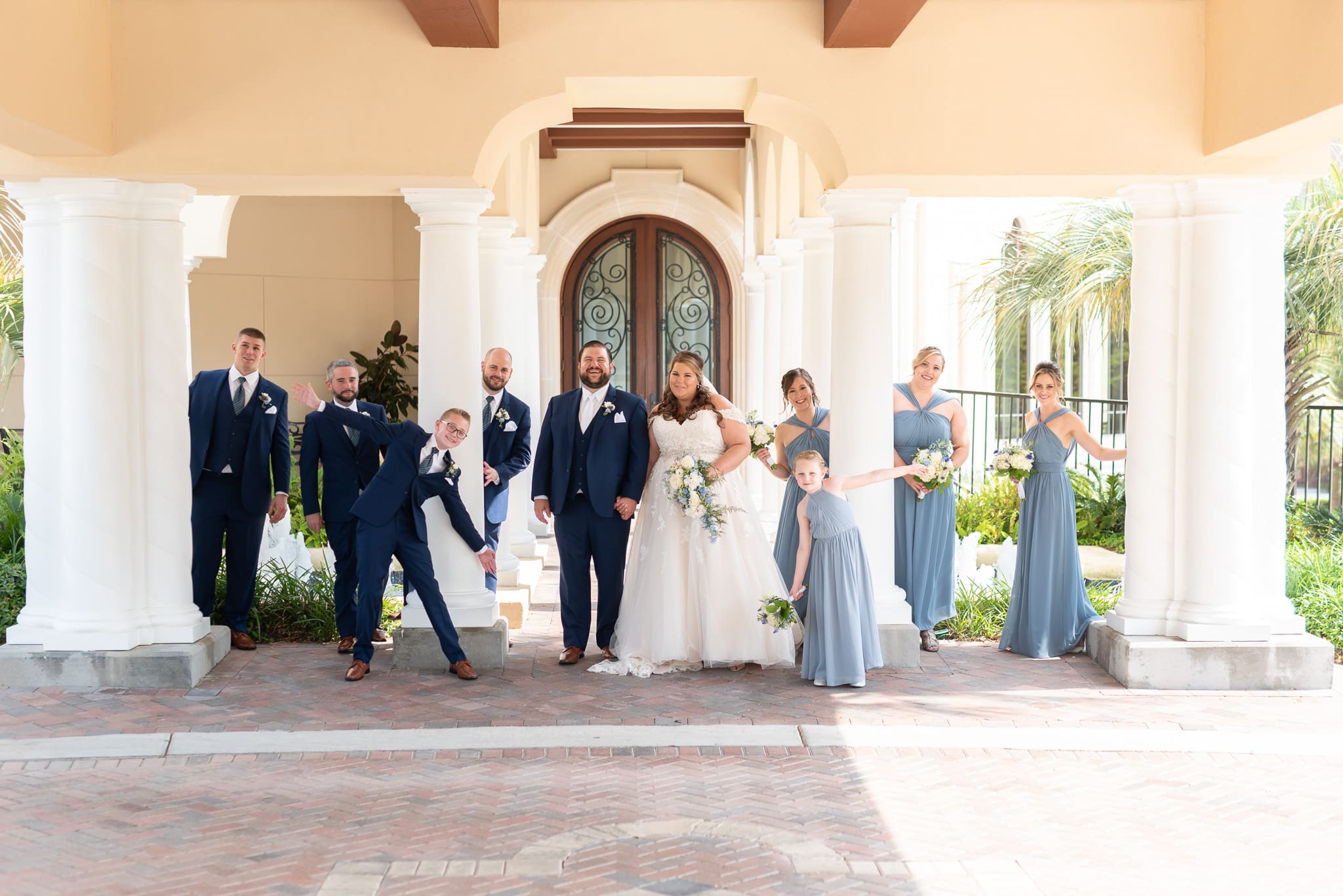Fun picture with the wedding party in front of the clubhouse - Grande Dunes Ocean Club