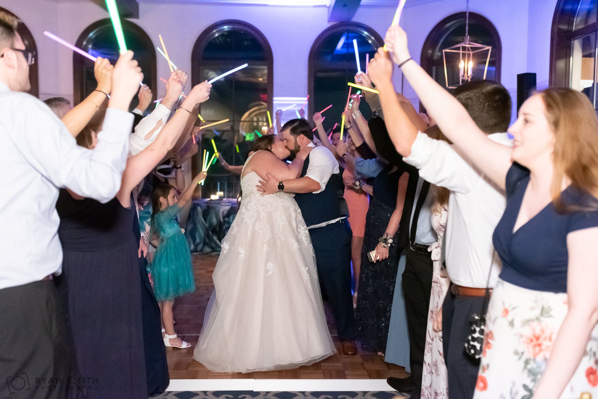 Glow stick exit with bride and groom Grande Dunes Ocean Club