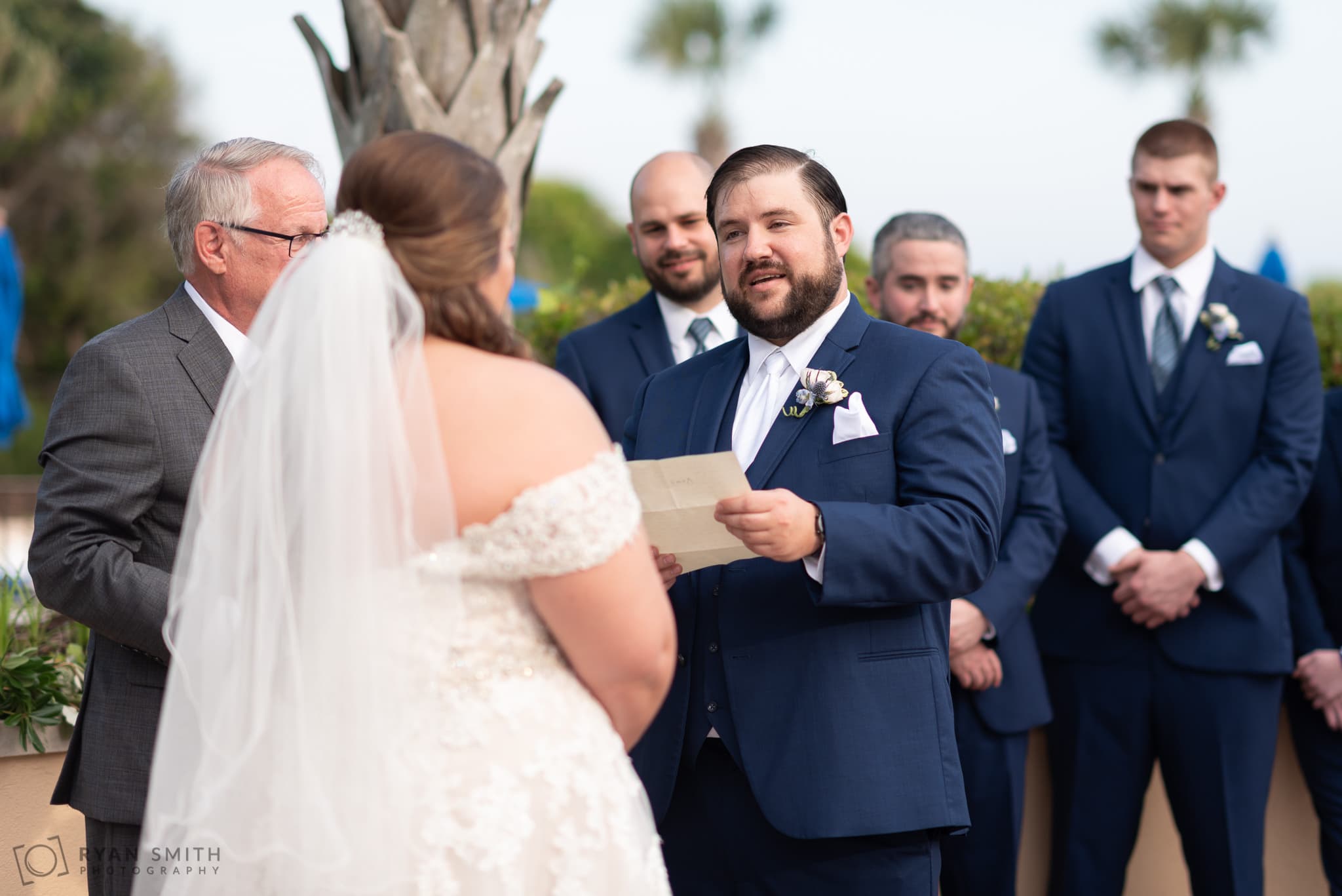 Groom giving vows to bride Grande Dunes Ocean Club