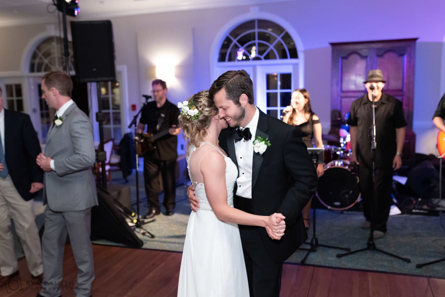 Bride and groom dancing at end of reception Wachesaw Plantation